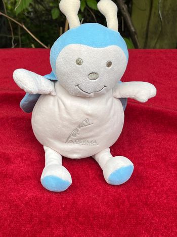 Doudou peluche coccinelle crème et bleue A-Derma