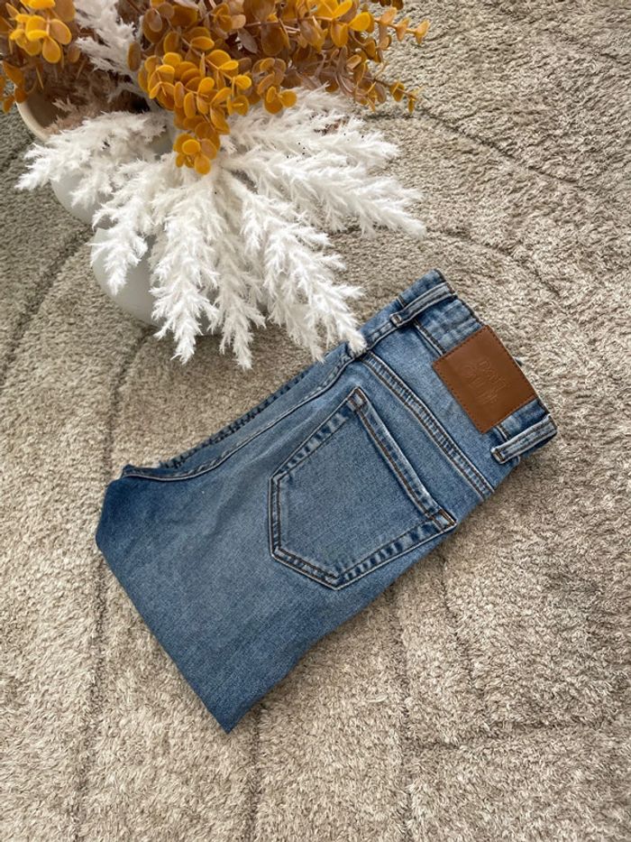 Jeans troué taille 30
