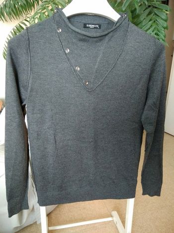 Pull gris coutures apparentes