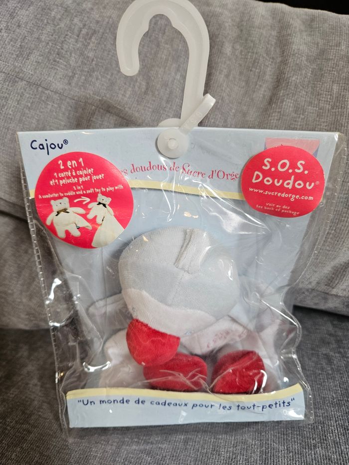 Doudou canard neuf sucre d'orge