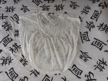 Blouse dentelée transparente 38