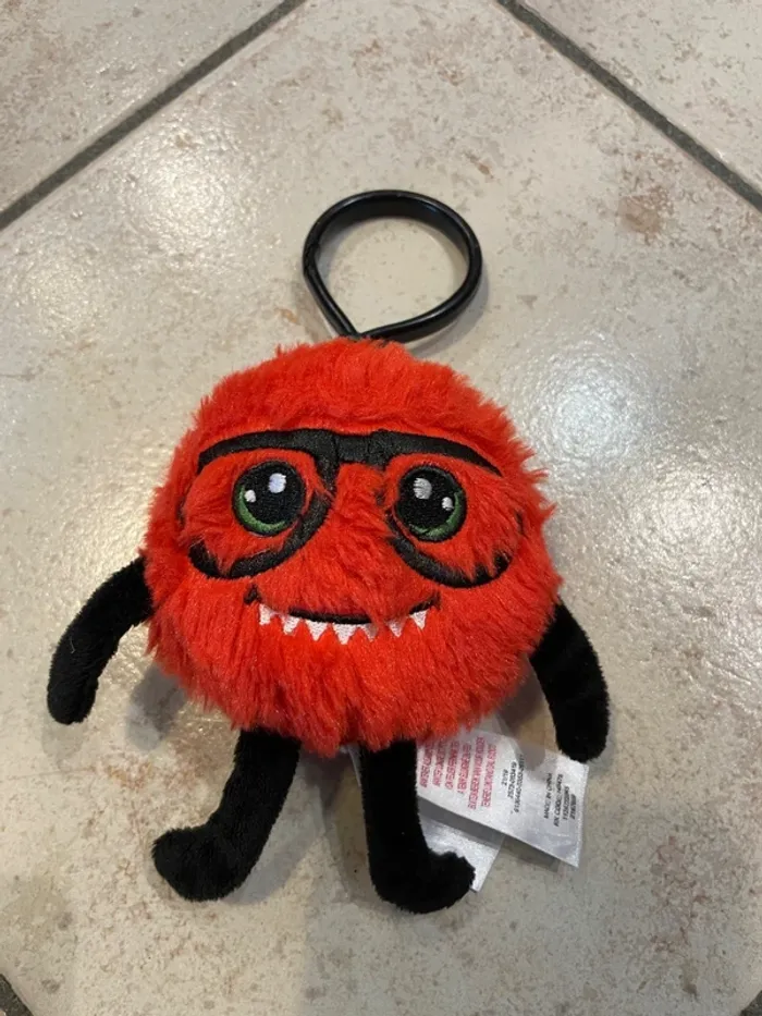 Peluche Primark monstre à lunettes