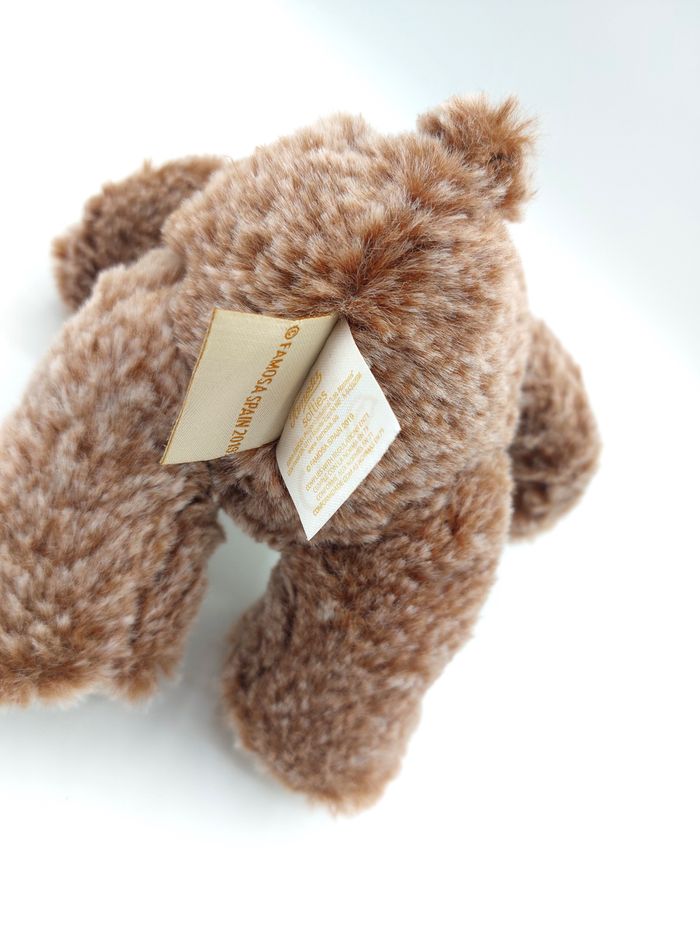 Peluche doudou ours marron chiné beige INTERFLORA Famosa 2019 20 cm nœud carreaux état neuf - photo numéro 4