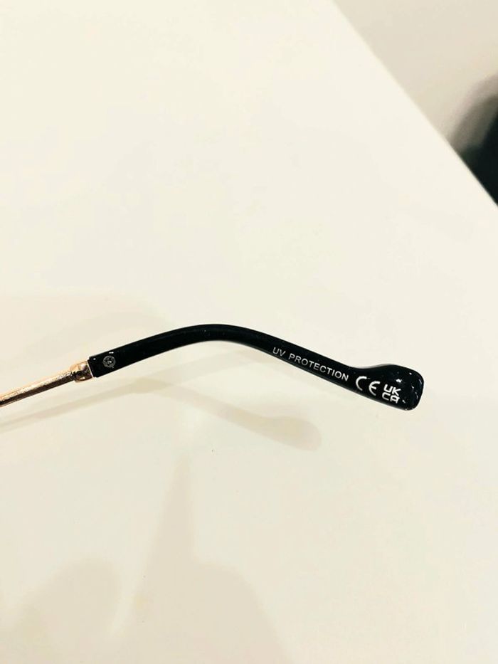 Lunette de soleil femme ronde noire et dorée uvprotection catégorie 3 - photo numéro 4