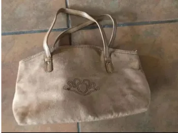 Sac à main en  peau de pêche neuf