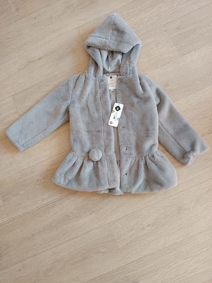 Veste fausse fourrure