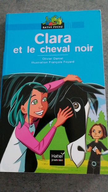 Livre clara et le cheval noir