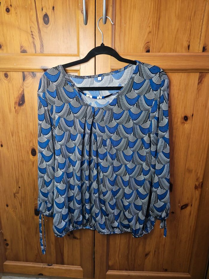 Belle tunique taille 5