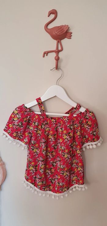 Blouse imprimée taille 6 ans en très bon état