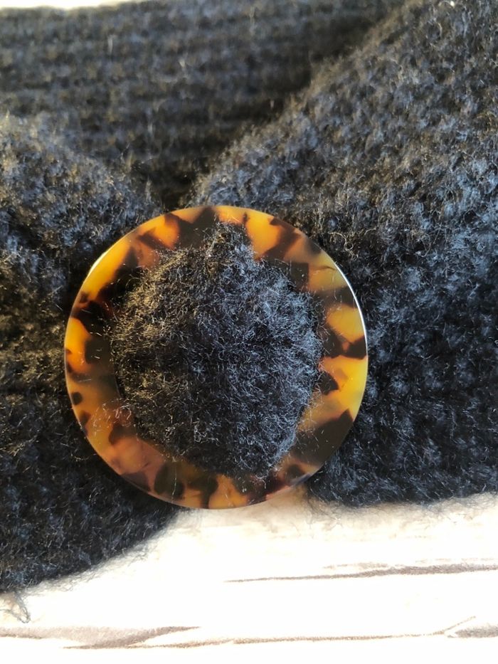 Bandeau noir en laine avec fantaisie