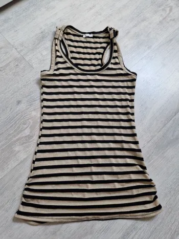 Débardeur Pimkie noir et doré à rayures étiquette de taille coupée mais convient à un XS