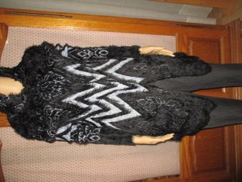 Gilet avec capuche T 42 ..