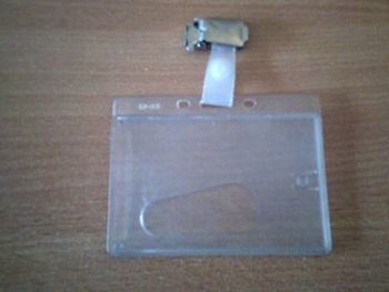 Badge en plastique  s'accroche