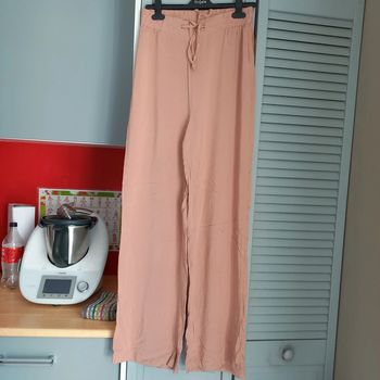Pantalon à jambes larges rose poudré