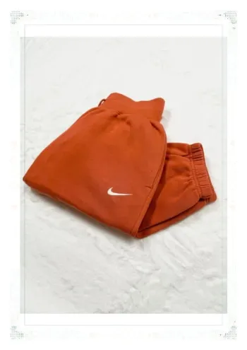 Nike pantalon taille haute coupe large orange femme taille XS coton