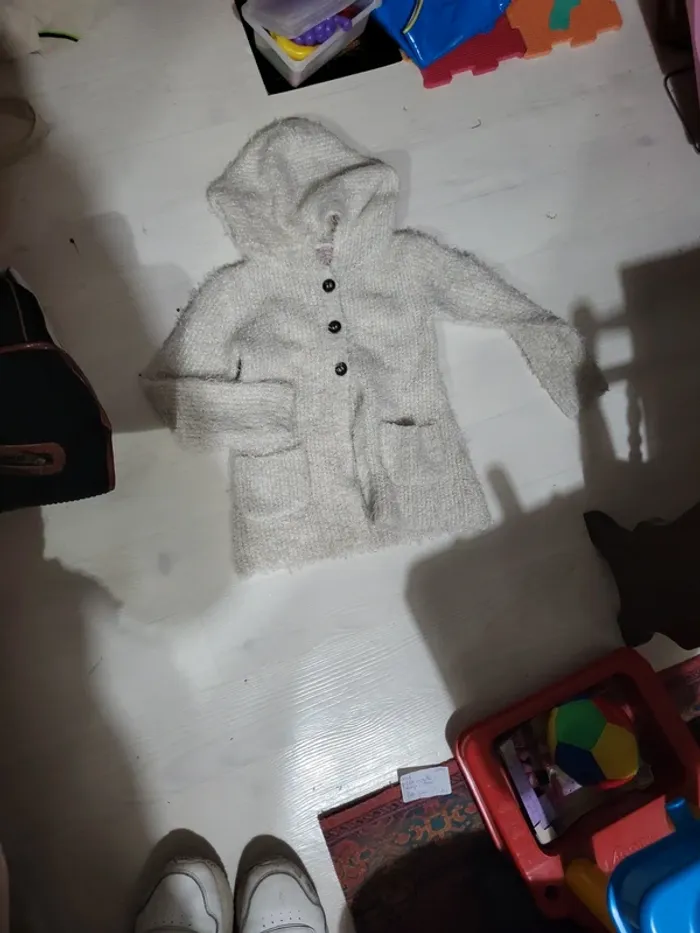 Gilet à capuche long