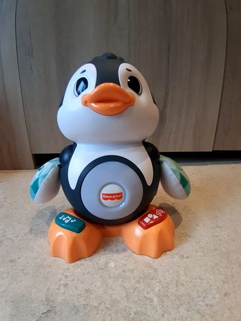 Jouet d'éveil interactif et musical pingouin fisher price