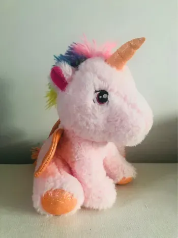 Peluche licorne rose arc en ciel fizzy ailes
