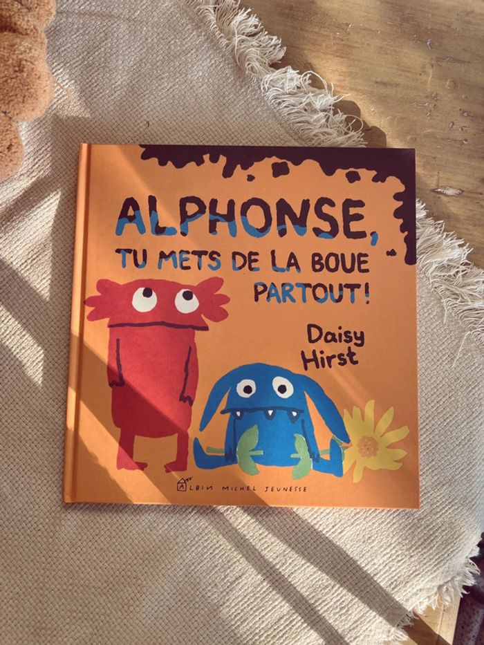 Livre « Alphonse tu met de la boue partout » neuf