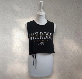 Top court sans manche noir taille L