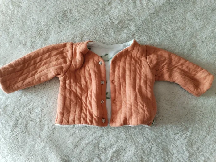 Gilet réversible 1 mois