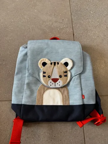 Sac à dos bleu clair Obaibi, très bon état, 18x22cm