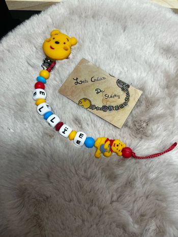 Attache tétine Winnie l’ourson
