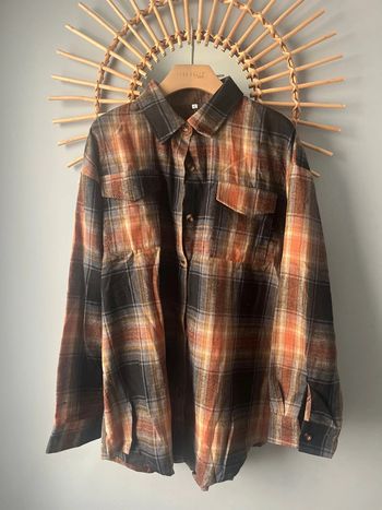 Chemise à carreau homme taille XL en très bon état porté une seule fois