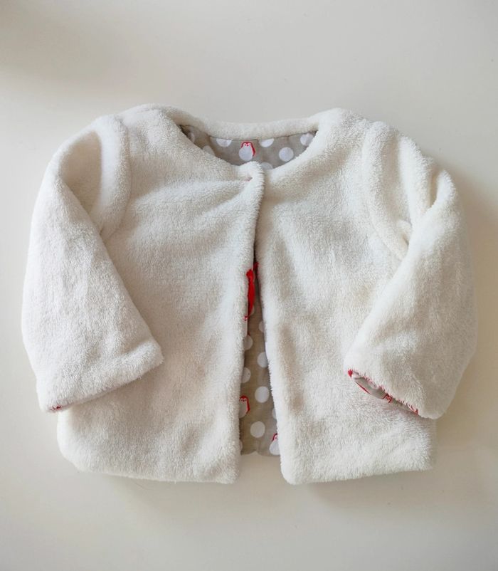 (a) veste fourrure blanche Obaibi