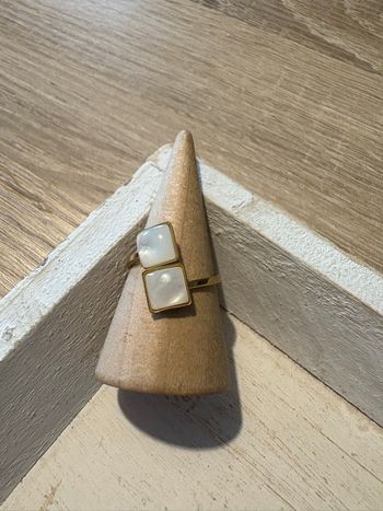 Bague dorée et blanche