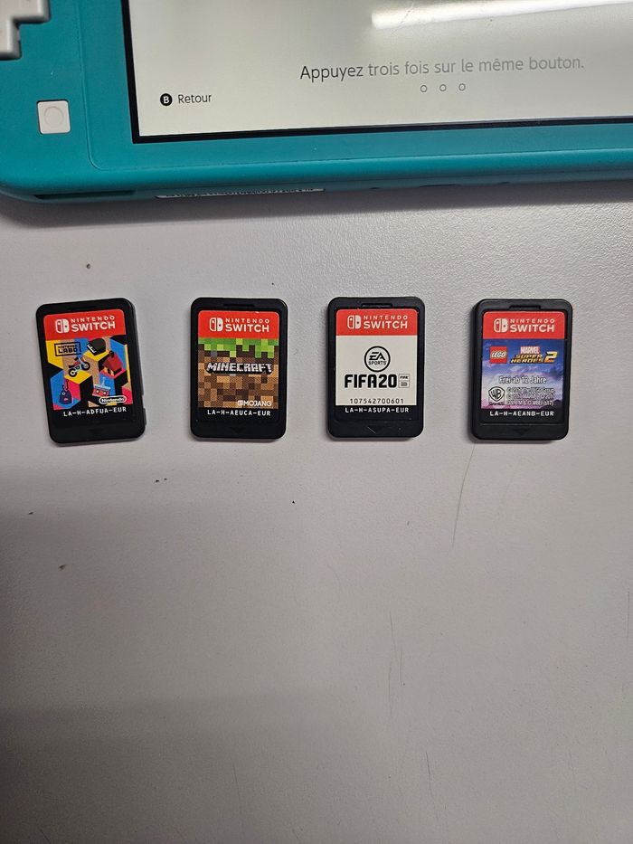Nintendo Switch lite bleu très bonne etat - photo numéro 6