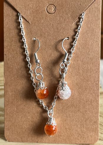 Collier et boucles d’oreilles perle orange