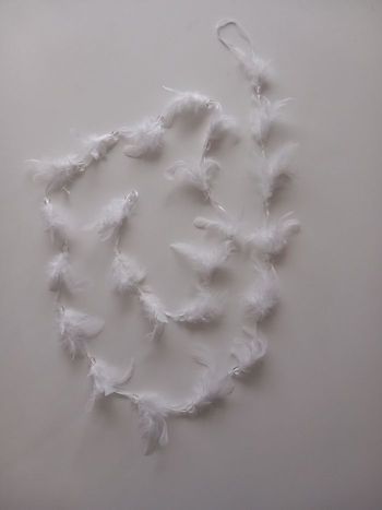 Guirlande plumes et perles