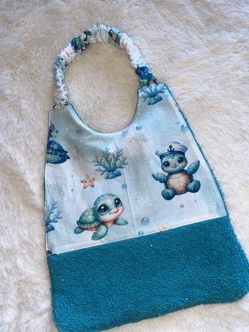 Bavoir élastique 8/24 