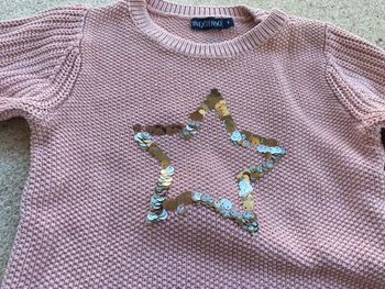 Pull rose in extenso étoiles à paillettes argent