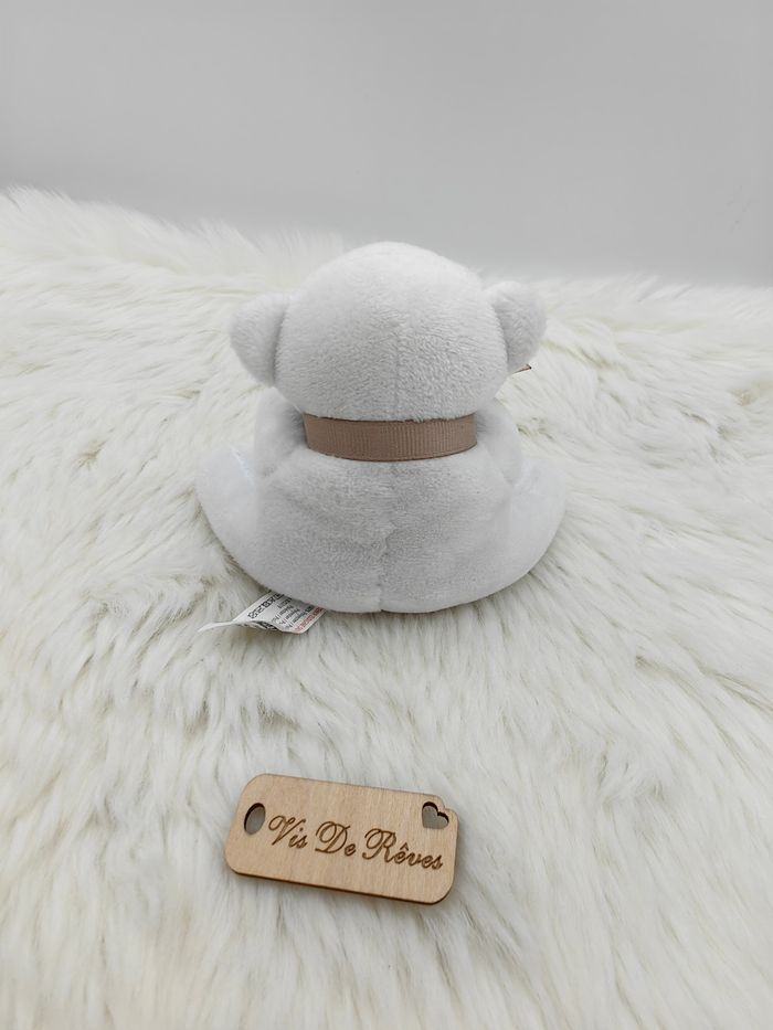Petite peluche Doudou Ours blanc Noeud marron chauss’expo - photo numéro 2