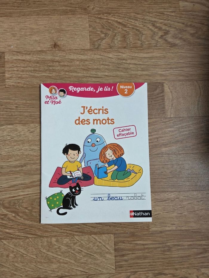 Livre ď écriture niveau 2 en bon état
