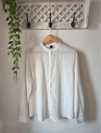 Blouse à bouton unicolore 40