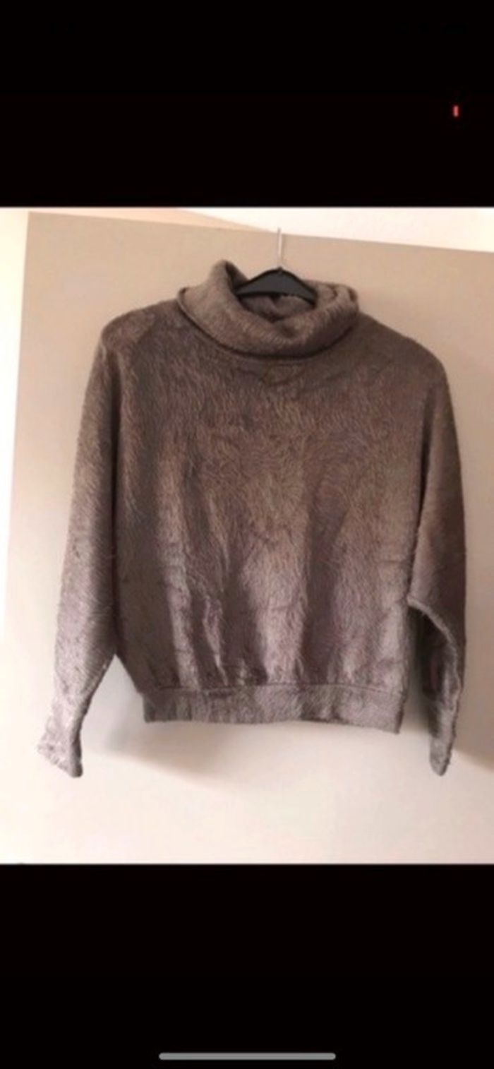 Pull col roulé