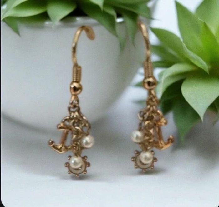 Boucles d'oreilles pendentif thème mer En très bon état