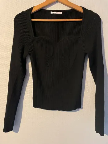 Pull camaïeu col en cœur