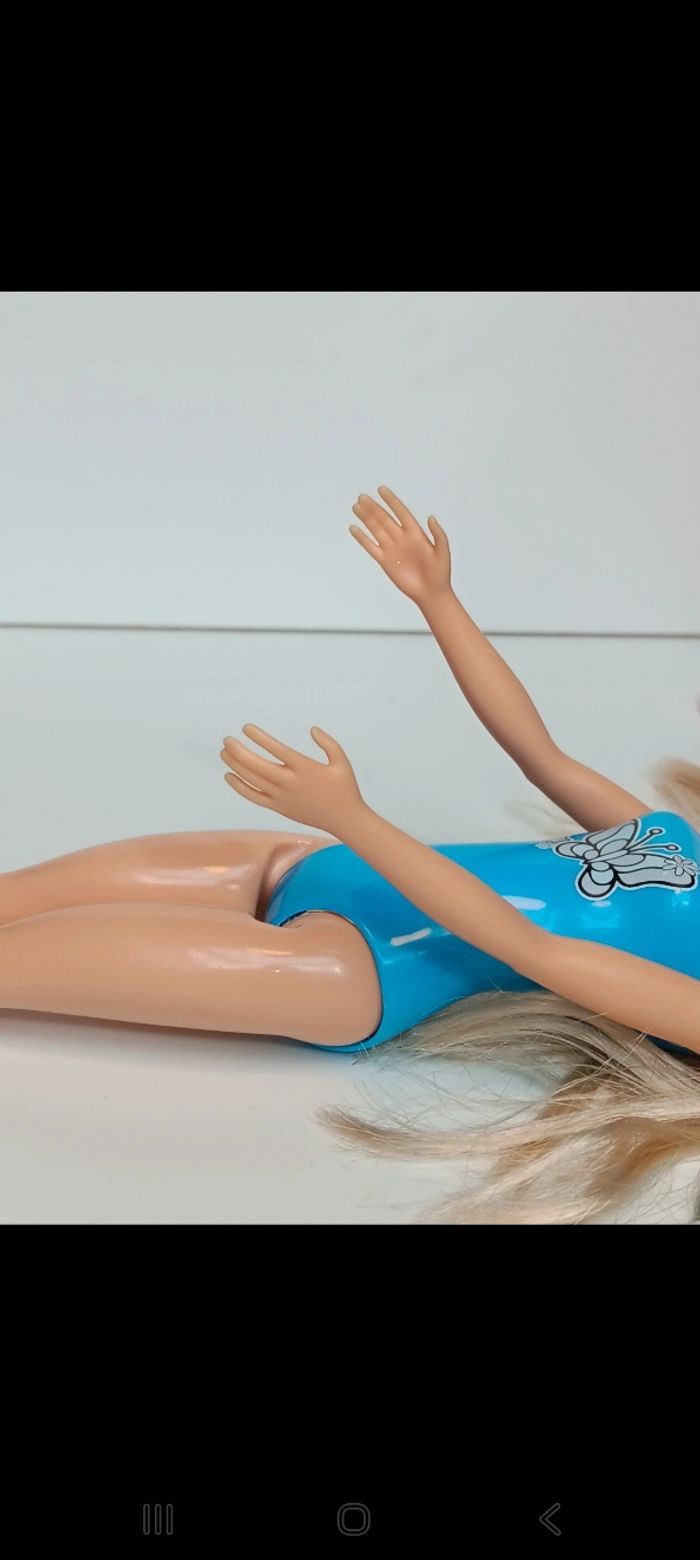 Poupée mattel barbie Color Reveal série 7 bleu hrk07
Poupée et ensemble compris - photo numéro 7