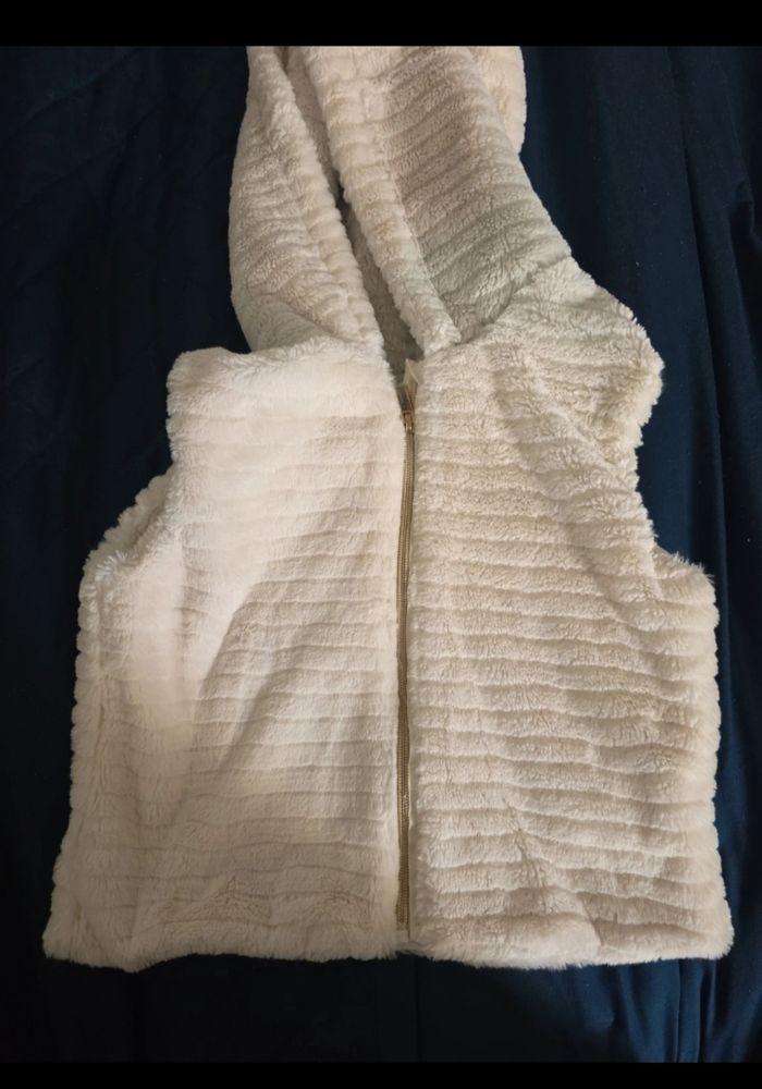 Doudoune manches longues en twill et sherpa + gilet pour fille

Taille 12ans - photo numéro 5