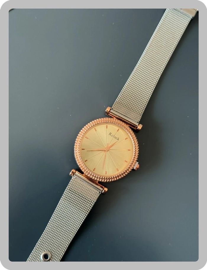 Montre à chaîne argentée à cadran rose