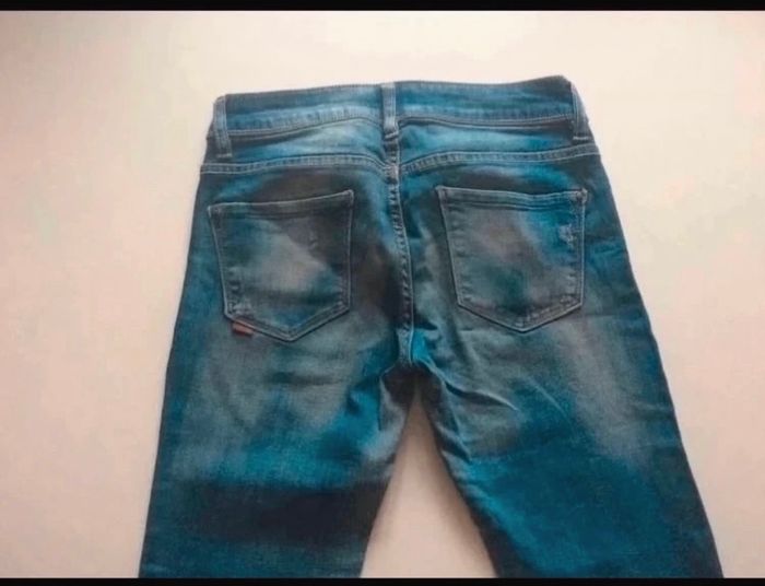 Jean pour femme TRÈS BON ÉTAT taille 38 / M couleur bleu - photo numéro 9