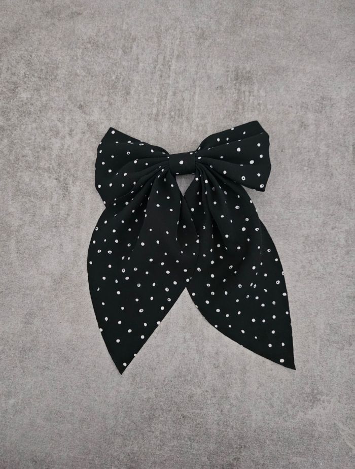 Pince noeud à pois