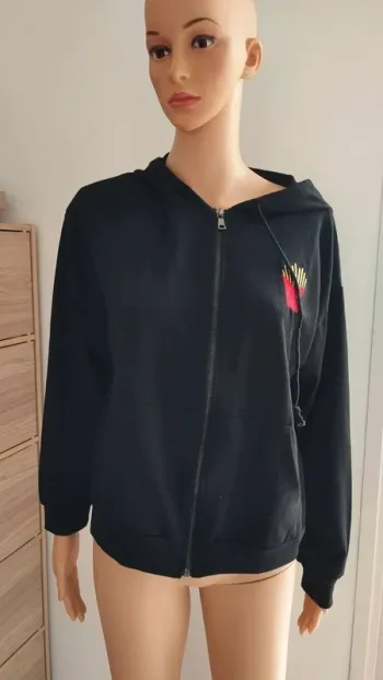 Gilet zippé noir avec motifs taille m/l femme