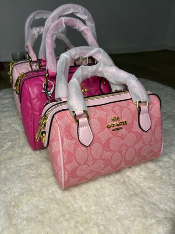Sac Coach Signature Rose – Chic & Féminité Intemporelle