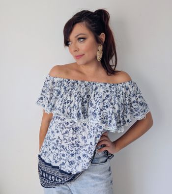 Blouse fluide épaules nues volantée fleurie style bohème chic printemps été Marque Eldys Taille 42 XL
Très bon état