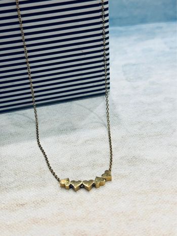 Collier pendentifs cœur acier or